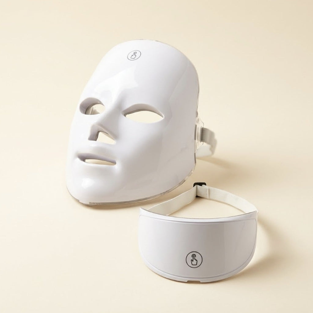 Lumière LED face mask and neck piece on a cream background